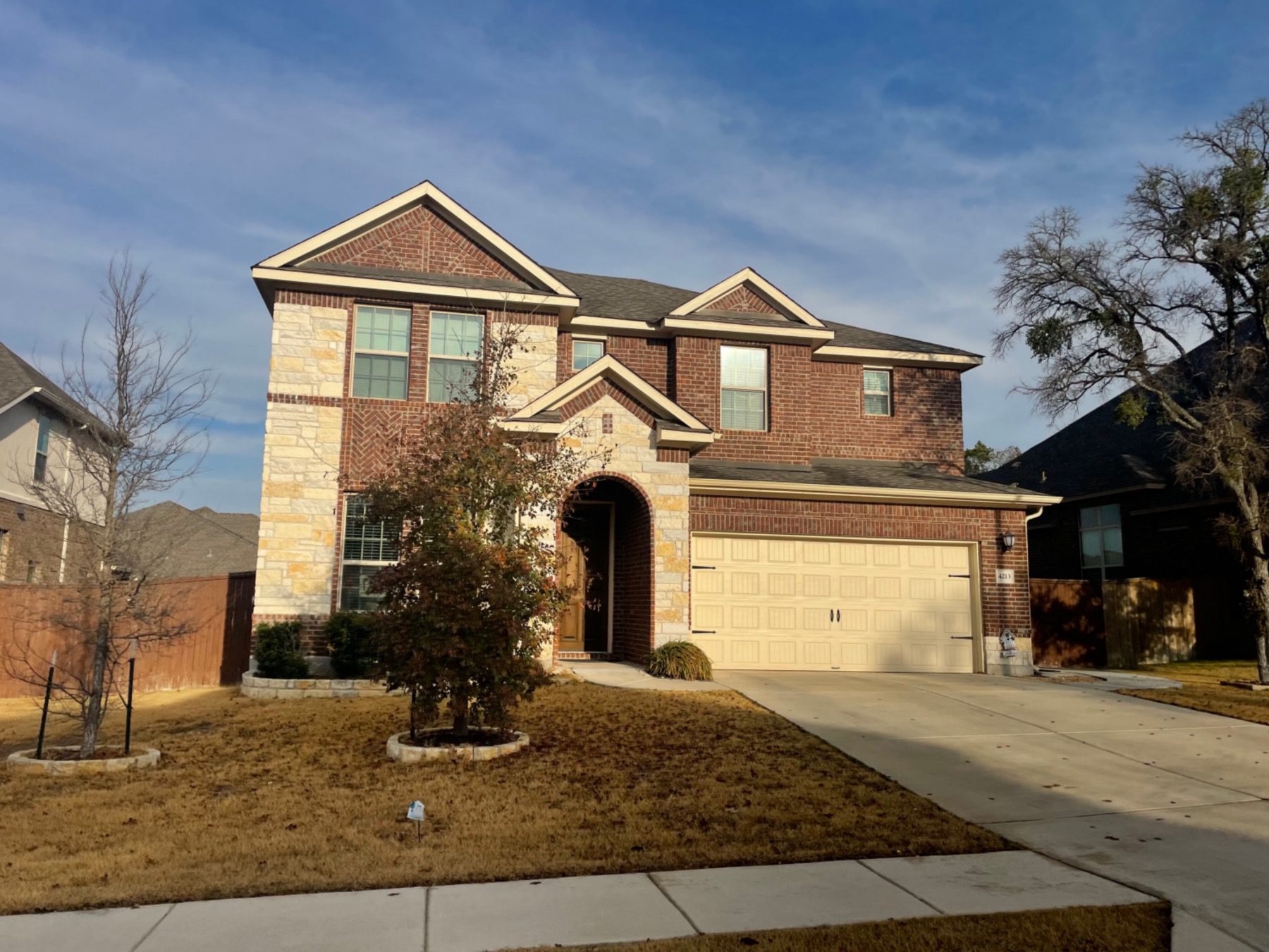 trails of shady oak brick stone 2 story home in leander tx 78641