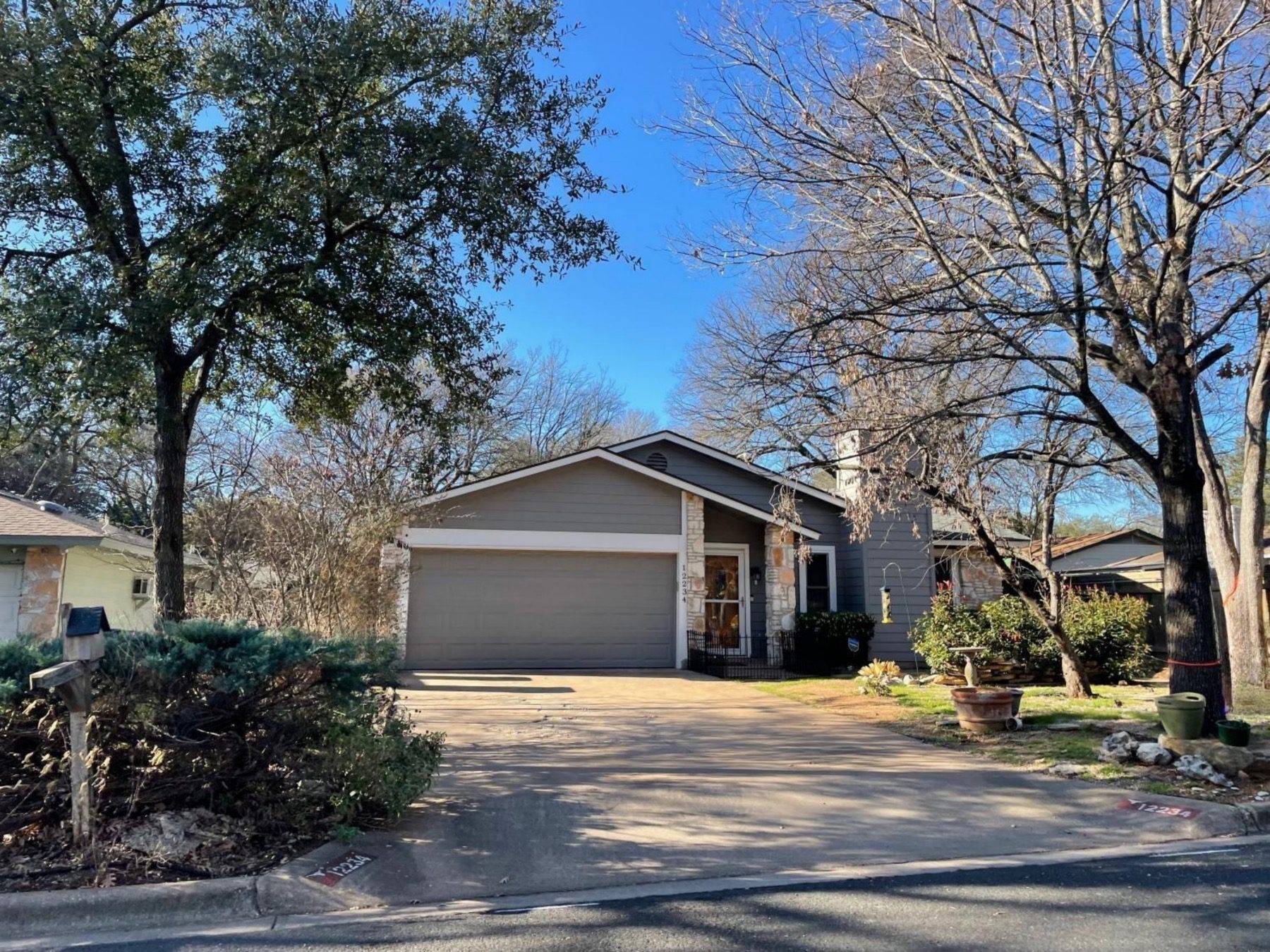 walnut crossing one story grey home in Austin 78759