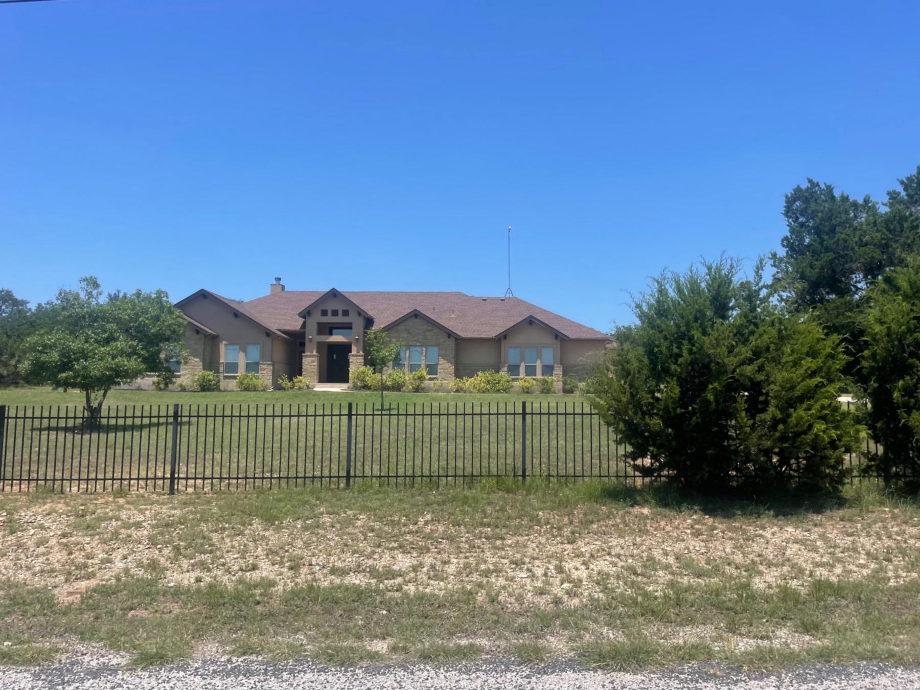 one story home in round mountain estates leander