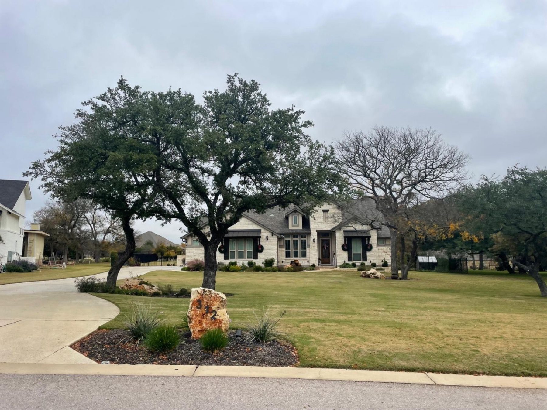 one story stone home Reagans overlook leander