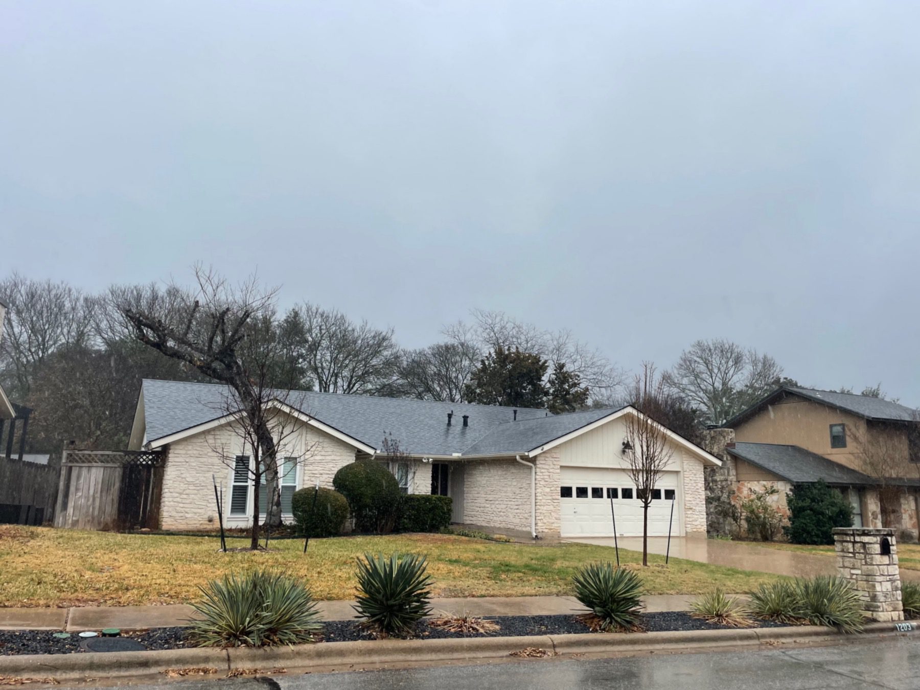 lost creek hilltop Austin one story stone home