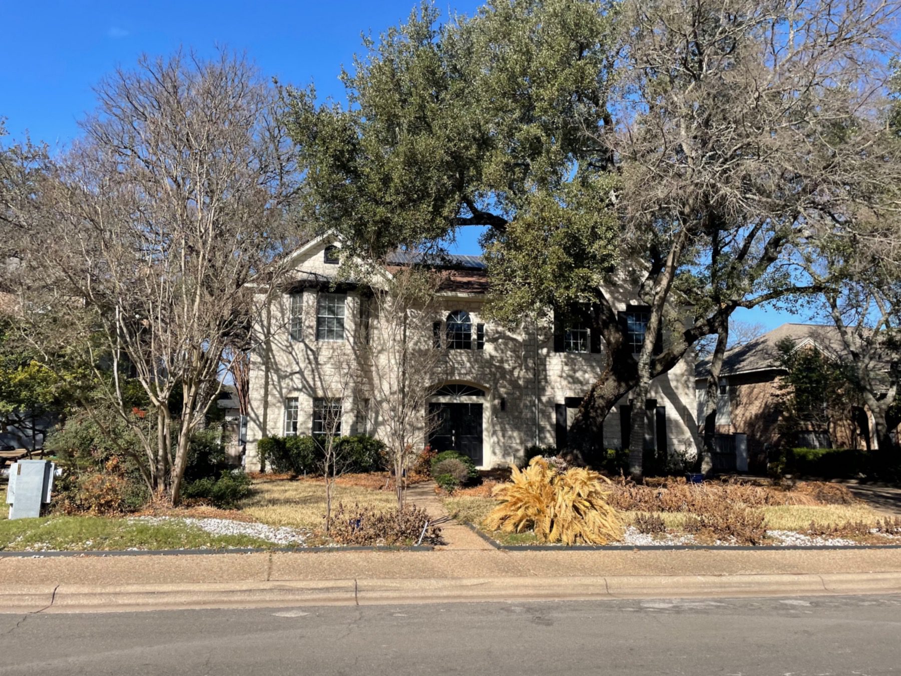 spicewood at bullcreek two story stone home in Austin